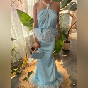 Elegant Blue Feathered Evening Gown